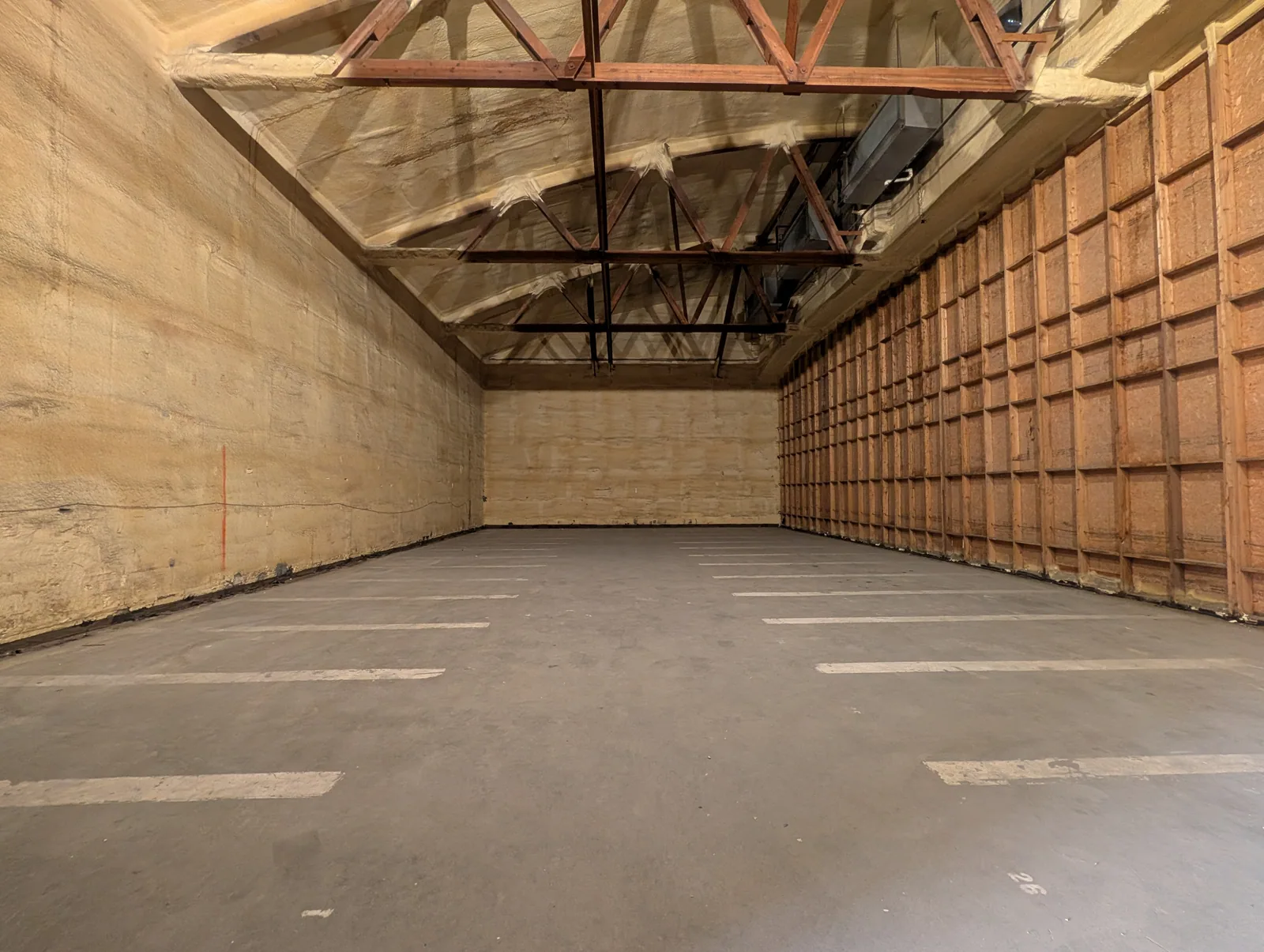 High-clearance open warehouse interior at Hawkeye Holdings